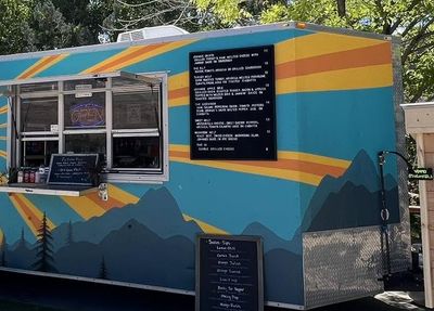 The service window open with the menu board beside it, ready to feed a party